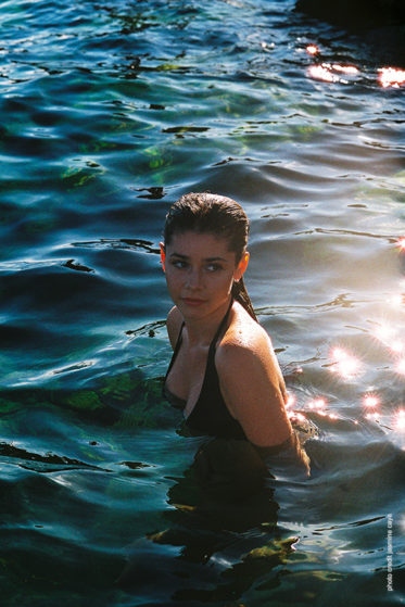 Artist AZURE in Lake Geneva on a summer evening.