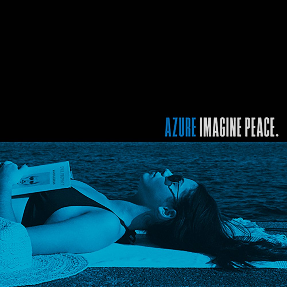 AZURE, singer songwriter lying on back with a book. Imagine Peace EP cover art.
