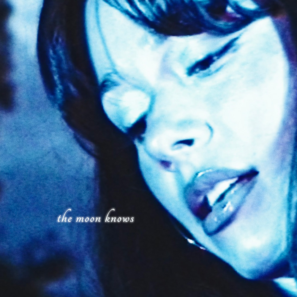 The Moon Knows album cover by Swiss artist AZURE. Face in blue